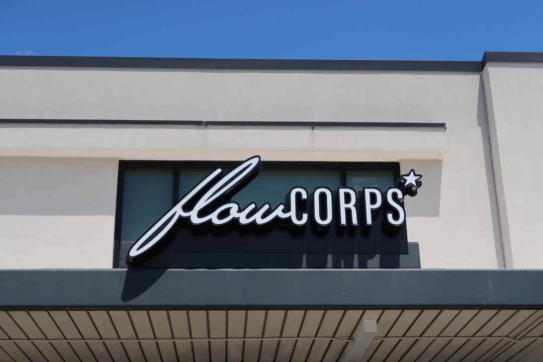 FlowCorps sign on the exterior of the Chapel Hill studio